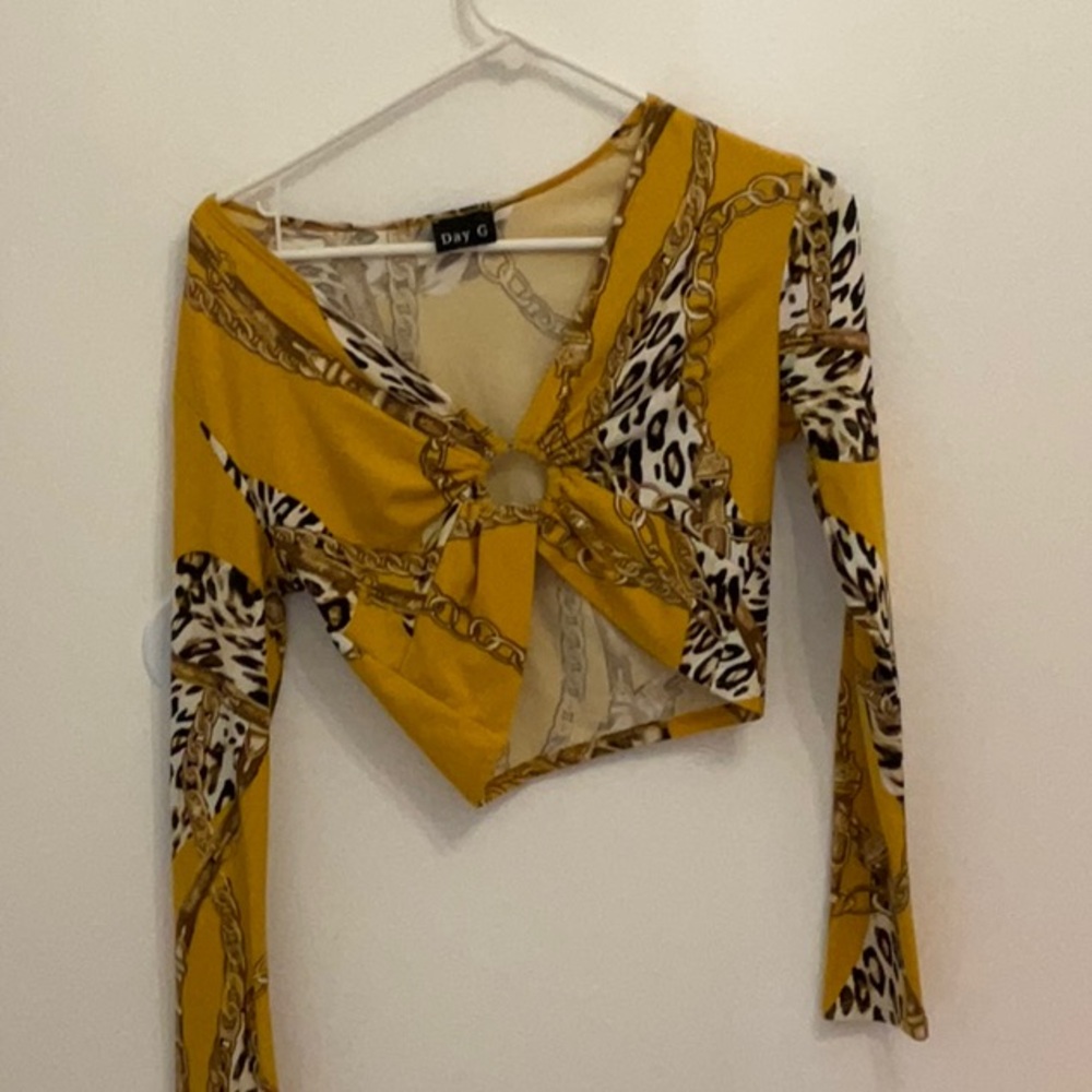 A simple gold crop top with more gold and zebra stripes for women